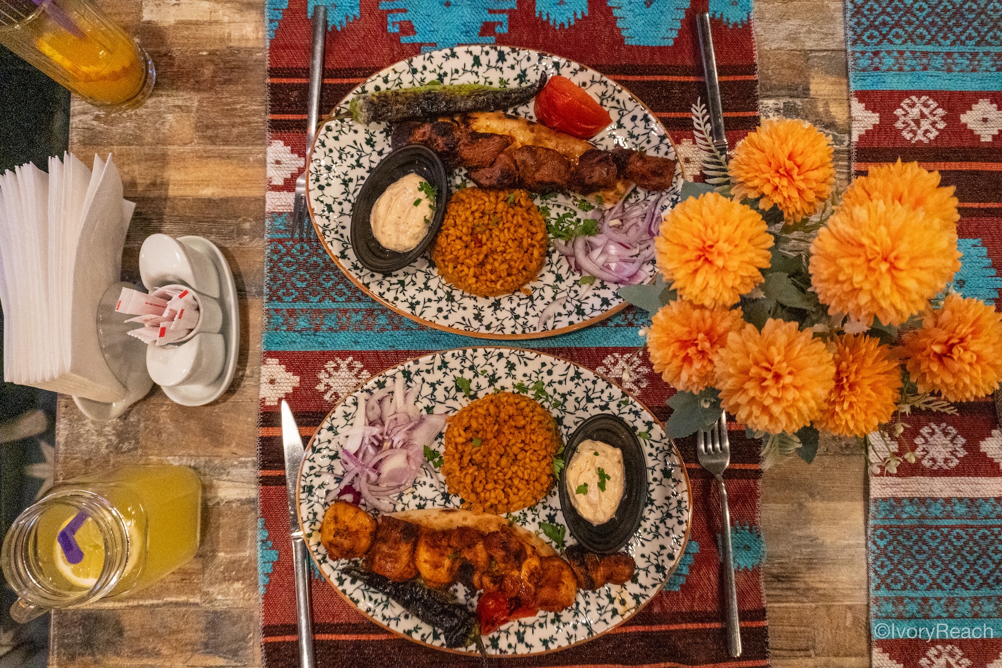 Kebab plates with orange flowers